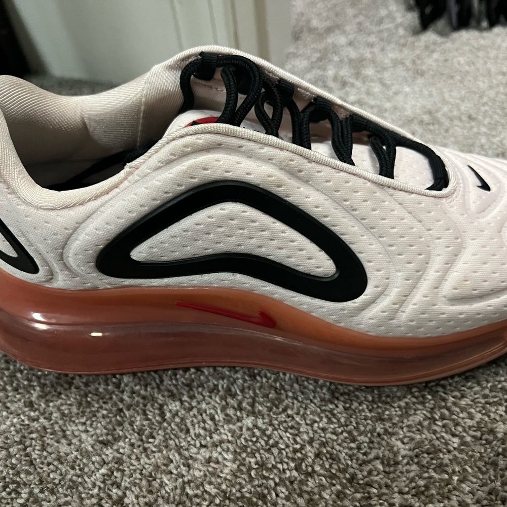 Two pairs of Nike Air size 9.5.